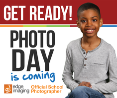 Student sitting and posing for photo